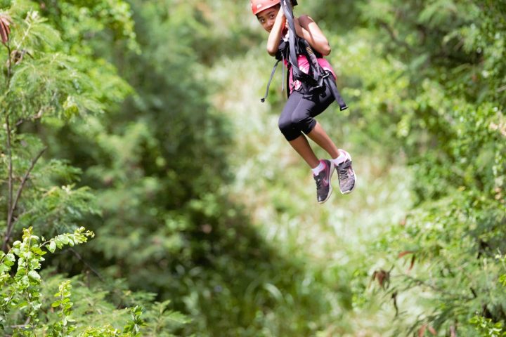 a man jumping in the forest
