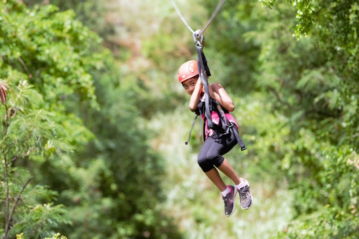 a man jumping in the forest