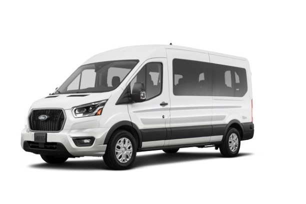 a van parked in front of a car